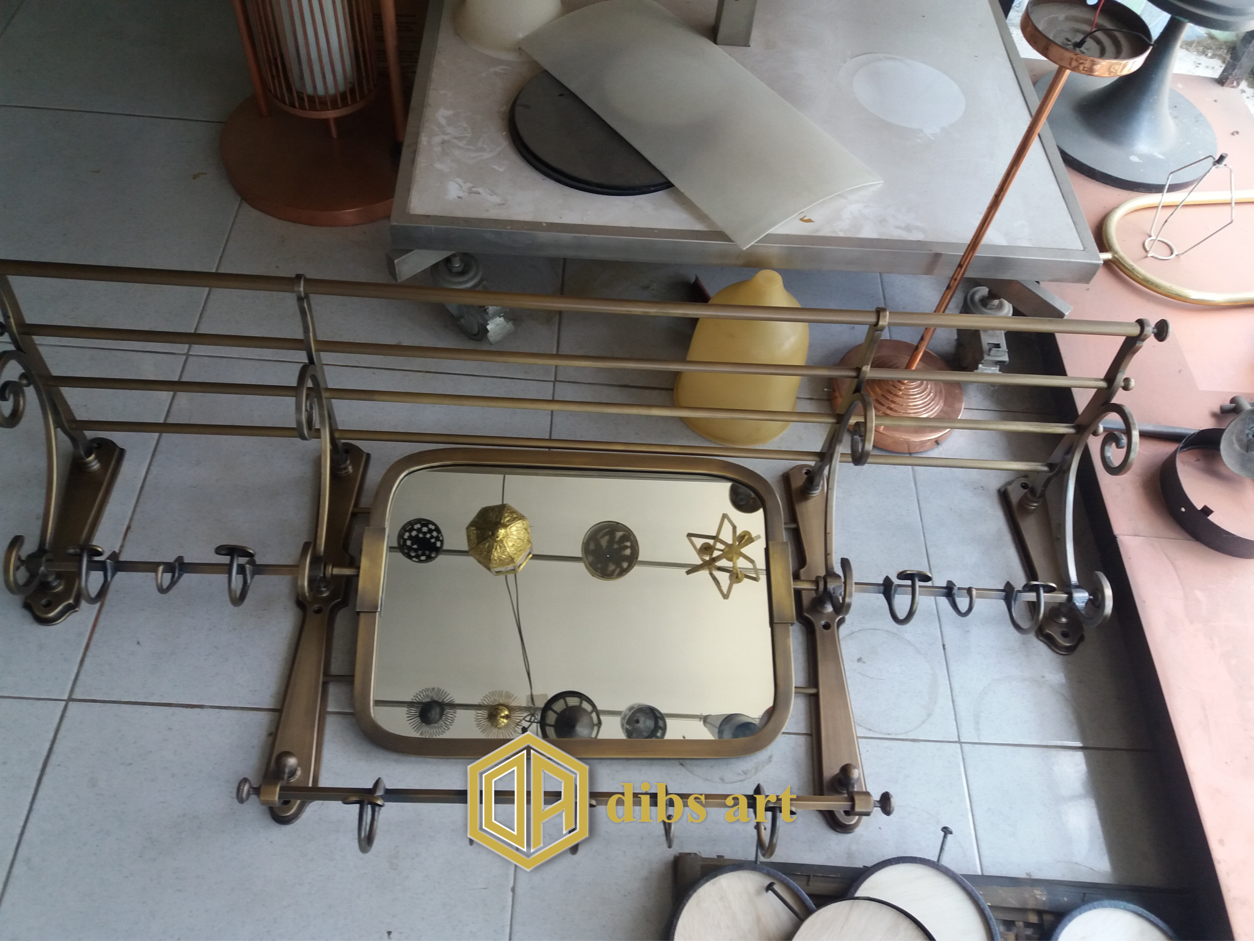 cermin kuningan kamar mandi